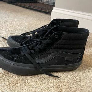 all black high top vans